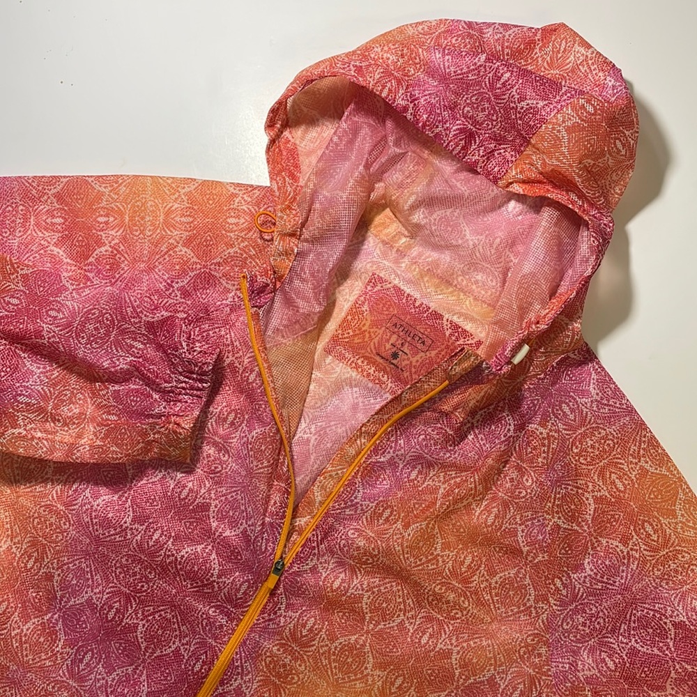 Athleta womens L Large orange pink floral lightweight running rain jacket EUC